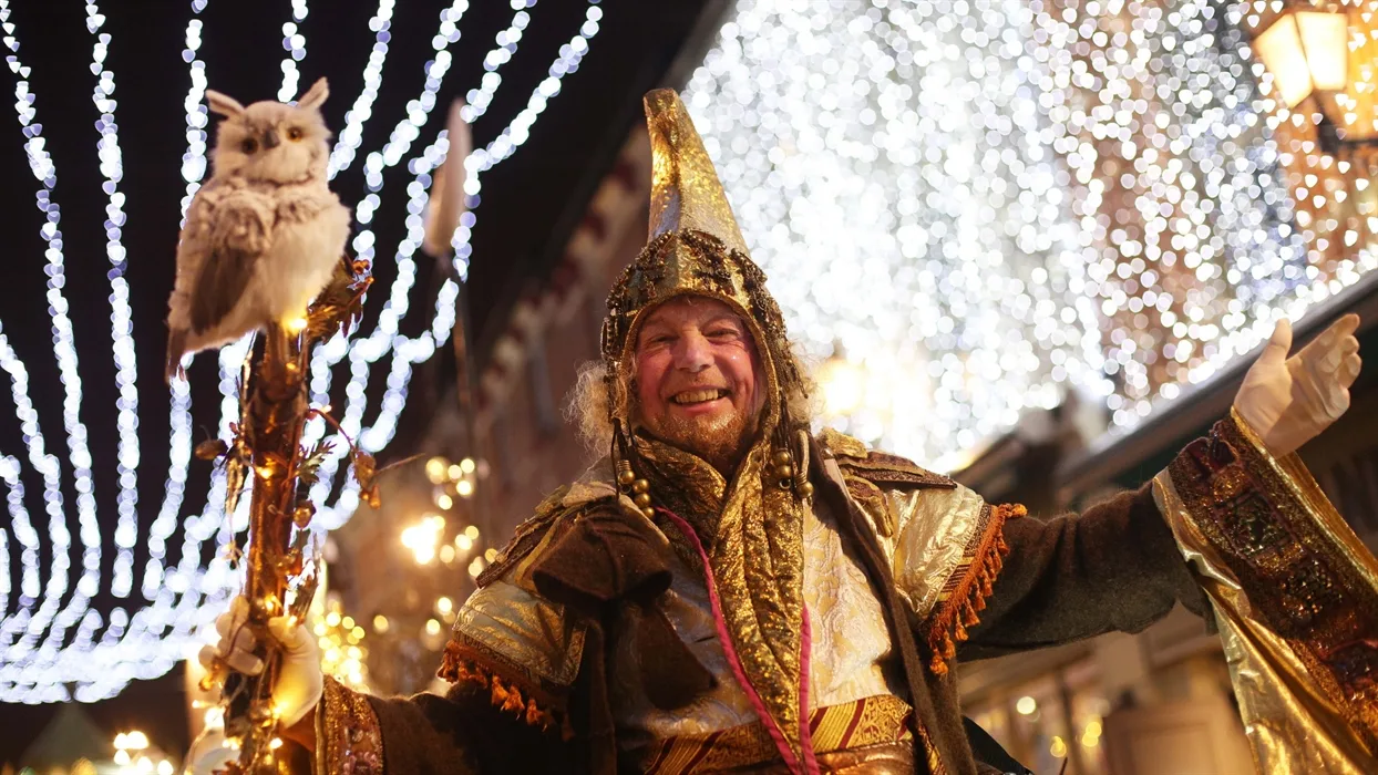 Festive performer beneath the Christmas lights in Derry